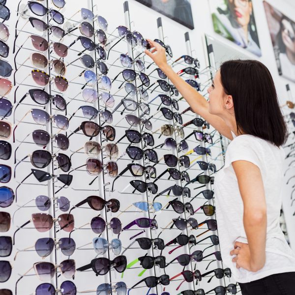 back-view-woman-checking-sunglasses